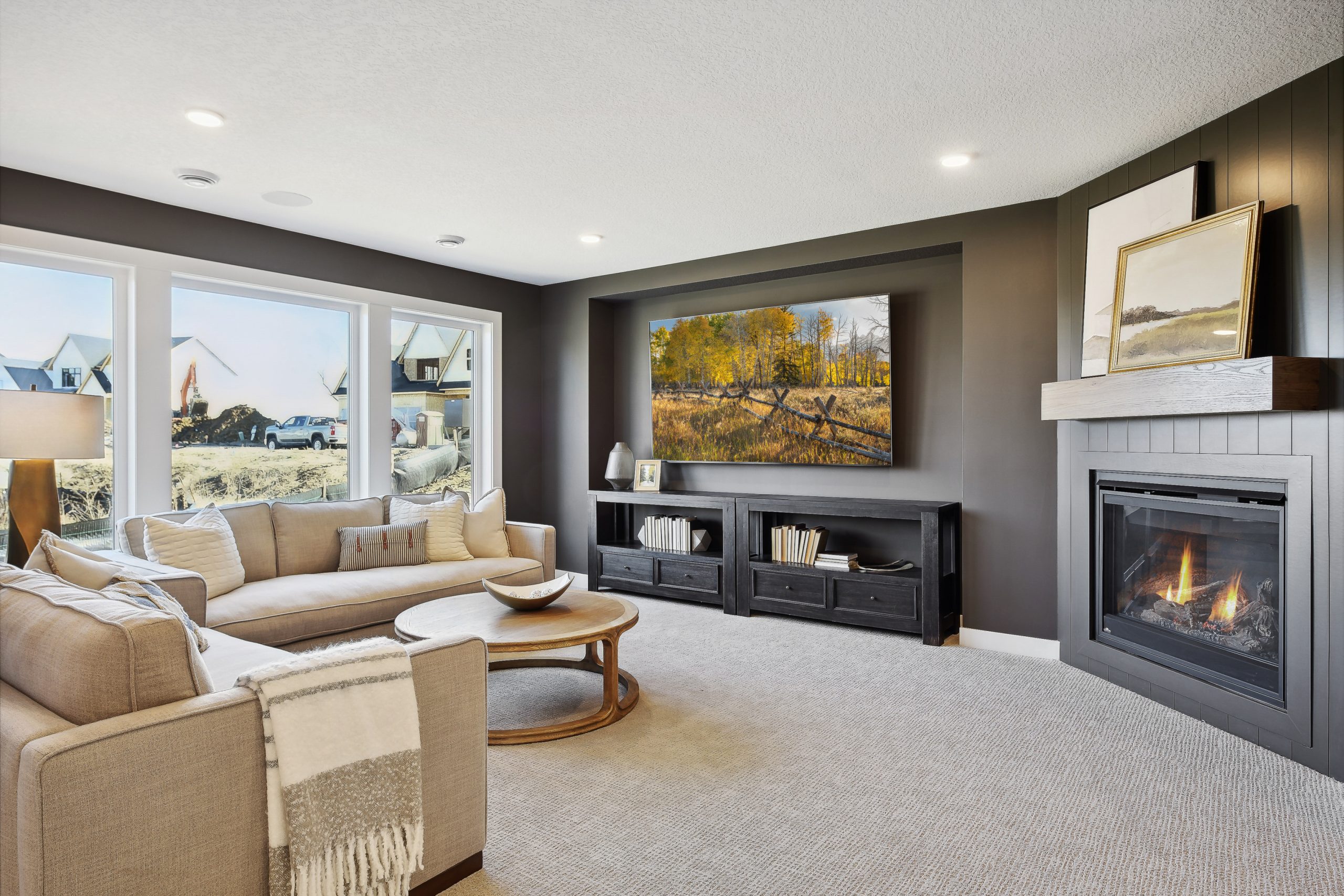 A living room designed and built by Hanson Builders, featuring essential furniture items.